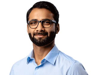 Smiling man in a blue dress shirt